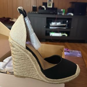 Just fab wedges black and tan. Never worn. 5.5